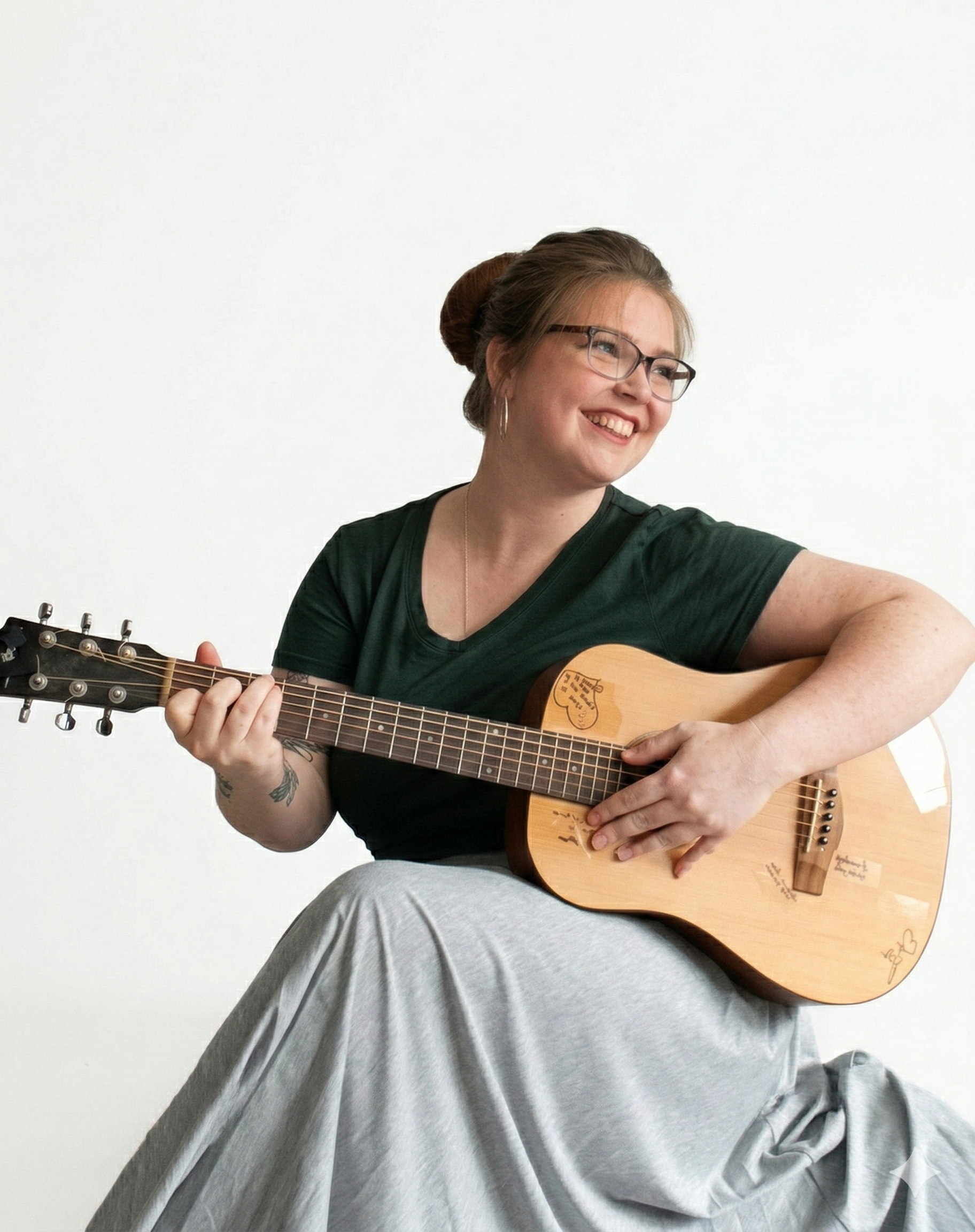 Joanna playing guitar